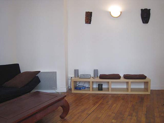 Living room with double-glazed windows facing the courtyard
