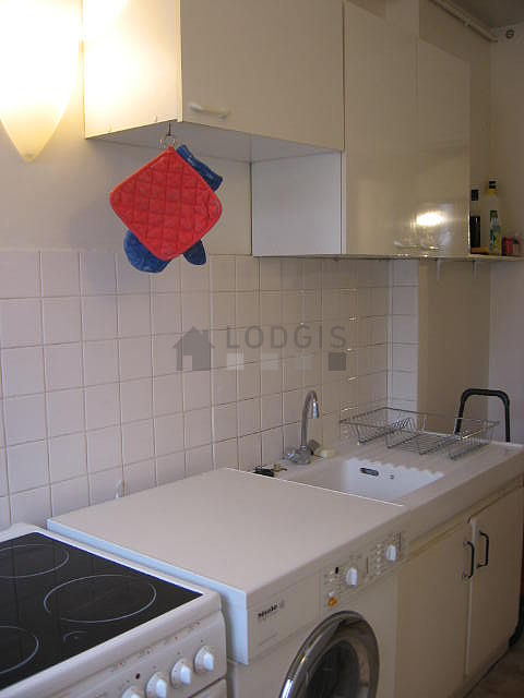 Bright kitchen with windows facing the courtyard