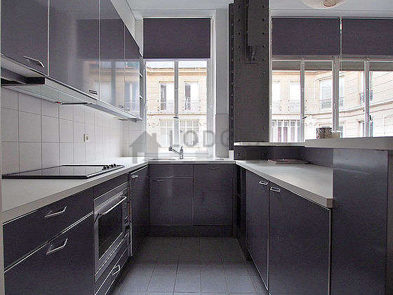 Kitchen where you can have dinner for 4 person(s) equipped with washing machine, refrigerator, crockery
