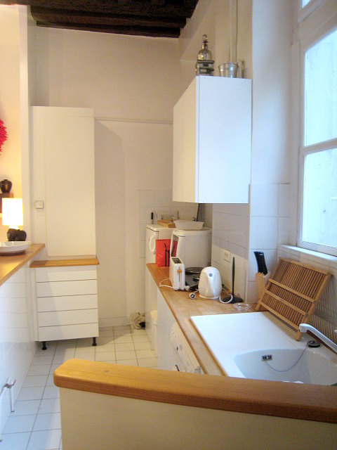 Kitchen where you can have dinner for 2 person(s) equipped with washing machine, refrigerator, freezer, crockery