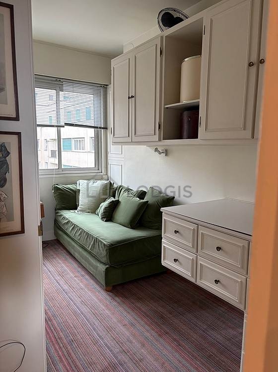 Bedroom with double-glazed windows facing the road