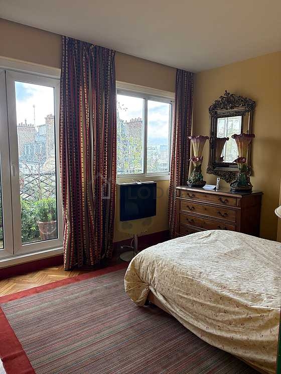 Bedroom with double-glazed windows facing the courtyard