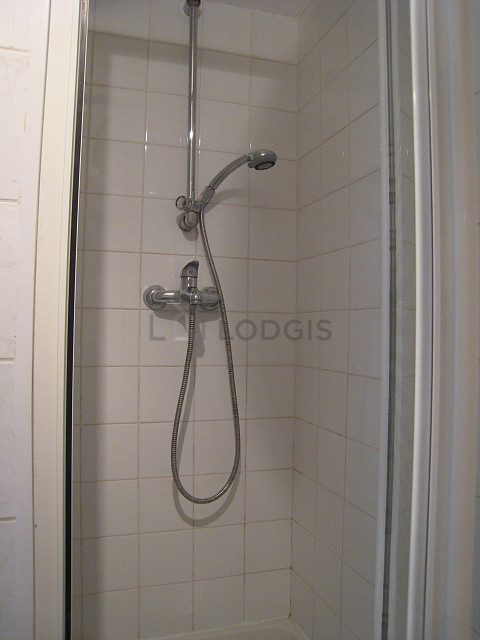 Bathroom equipped with washing machine, bath towels