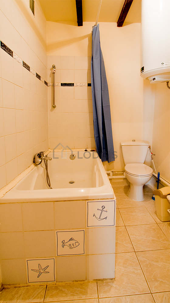 Bathroom with tile floor