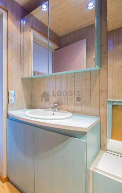 Bright bathroom with woodenfloor