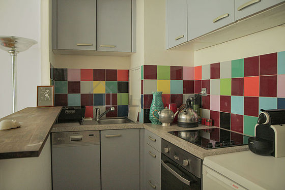 Kitchen equipped with dishwasher, hob, refrigerator, freezer