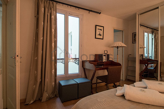 Bedroom with double-glazed windows facing the courtyard