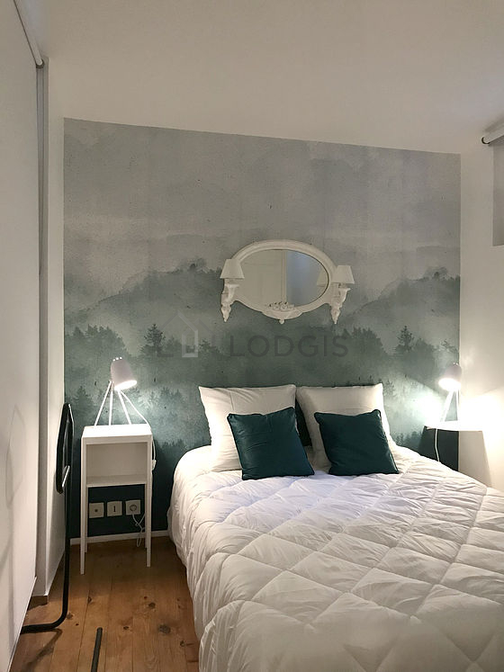 Bedroom with wooden floor