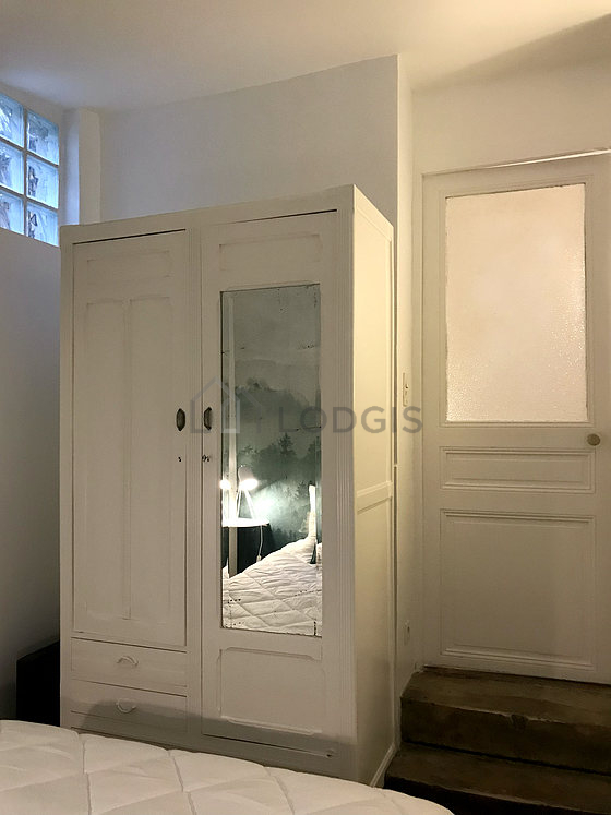 Bedroom with double-glazed windows facing the courtyard