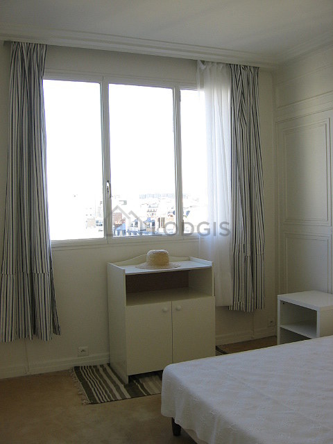 Bedroom with wooden floor