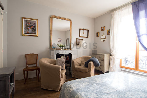 Bedroom with wooden floor