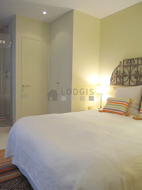 Chambre de 11m² avec du parquet au sol