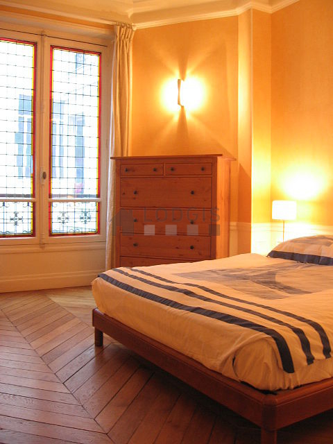 Bedroom with windows facing the courtyard