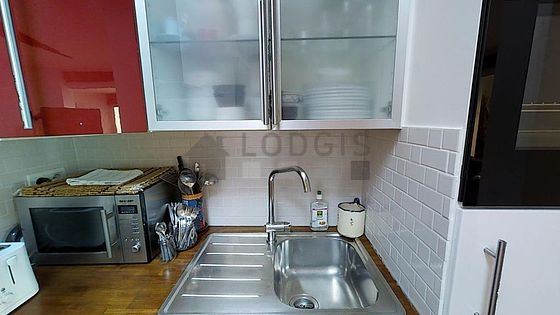 Kitchen where you can have dinner for 4 person(s) equipped with dishwasher, hob, refrigerator, extractor hood