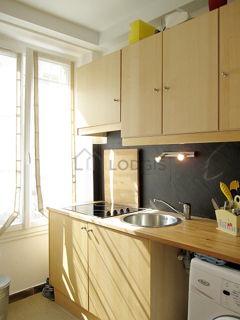 Kitchen where you can have dinner for 2 person(s) equipped with washing machine, refrigerator, crockery, stool