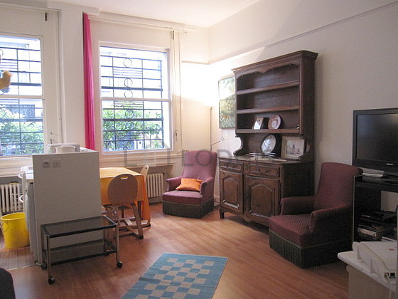 Quiet living room furnished with 1 sofabed(s) of 140cm, tv, hi-fi stereo, fan