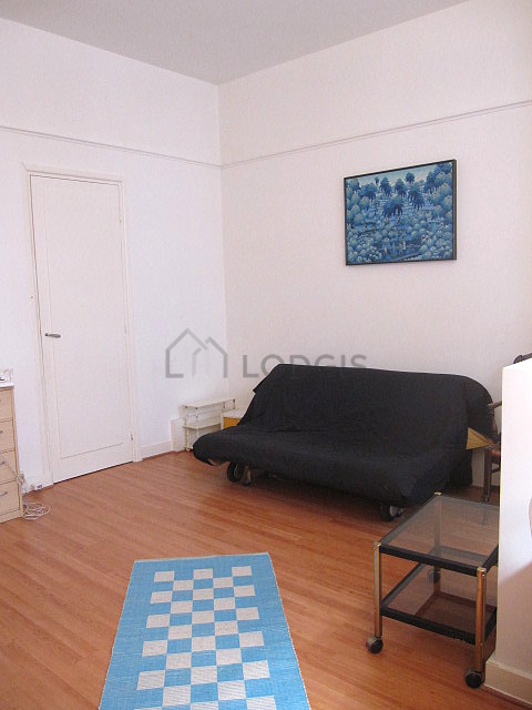 Living room with windows facing the road