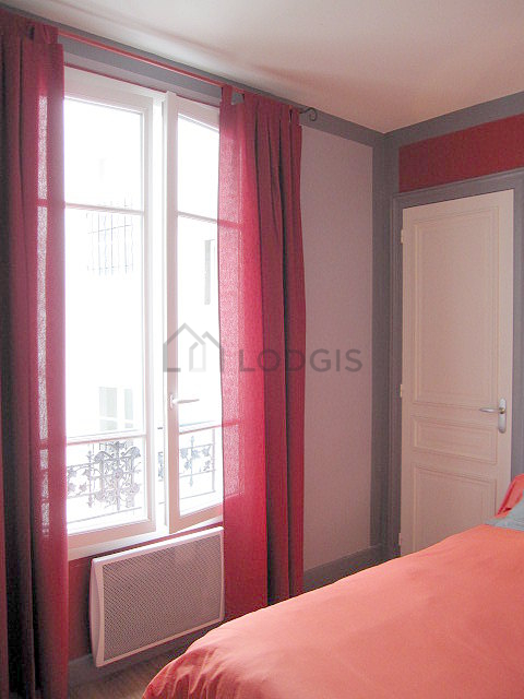 Chambre de 12m² avec du parquet au sol