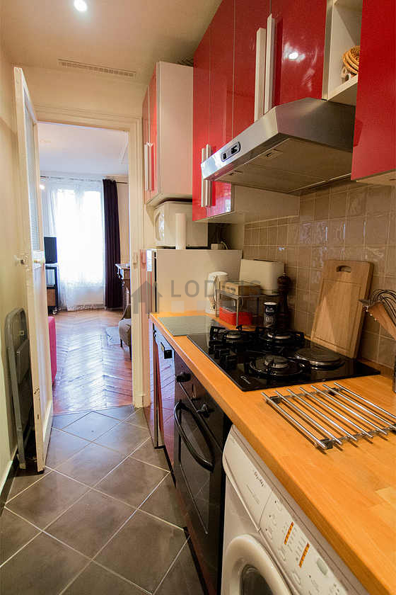 Kitchen with double-glazed windows facing the courtyard