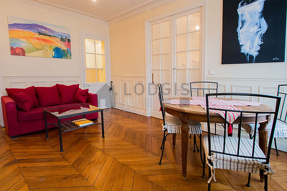 Quiet living room furnished with 1 sofabed(s) of 120cm, air conditioning, tv, dvd player
