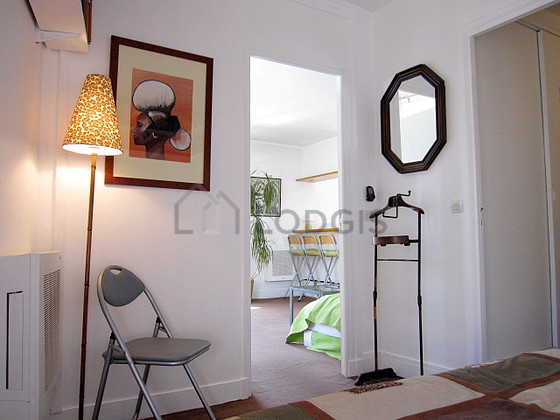 Bedroom with double-glazed windows and balcony facing the road