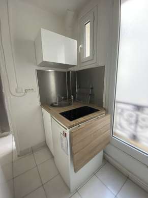Kitchen equipped with hob, refrigerator, freezer