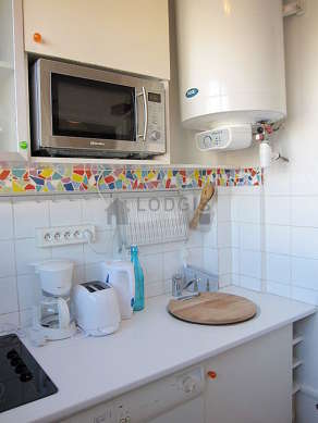 Kitchen where you can have dinner for 2 person(s) equipped with washing machine, refrigerator, crockery, stool