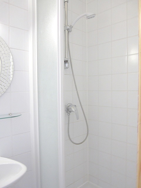 Bathroom equipped with shelves