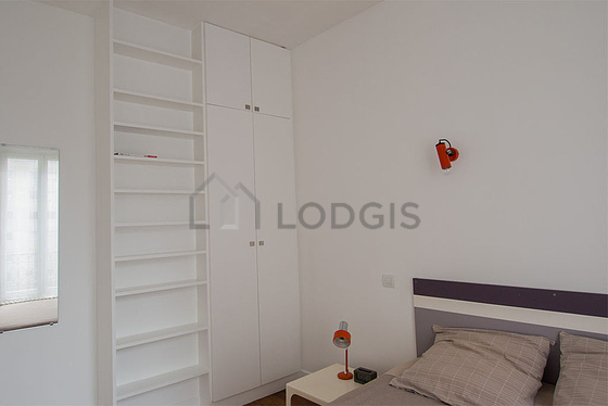 Bedroom with double-glazed windows facing the courtyard