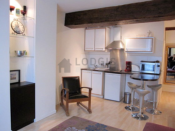 Living room with double-glazed windows facing the road
