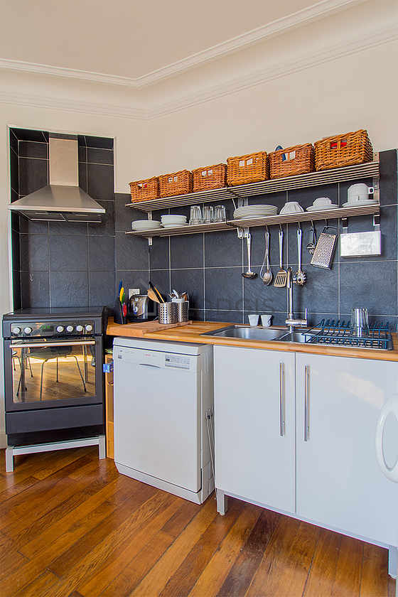 Kitchen equipped with dishwasher, hob, refrigerator, freezer