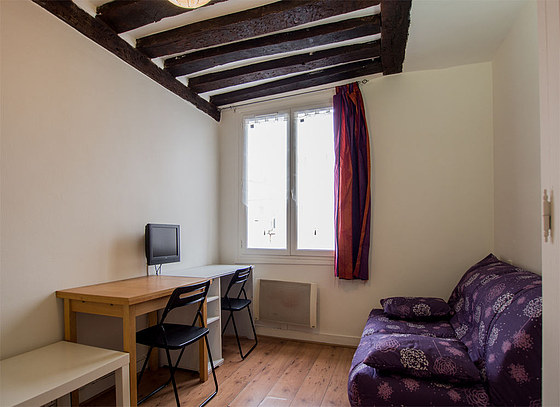 Very quiet living room furnished with 1 sofabed(s) of 140cm, tv, wardrobe, cupboard