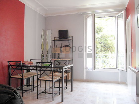 Living room with tile floor