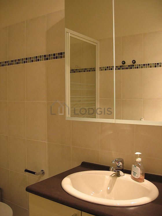 Pleasant bathroom with tile floor