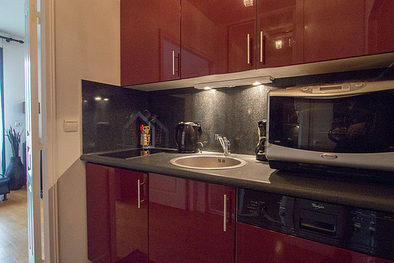 Belle cuisine avec du parquet au sol