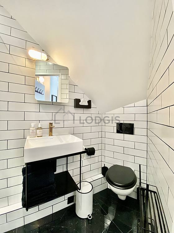 Beautiful and bright bathroom with tile floor