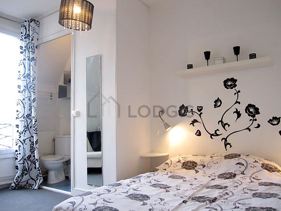 Bedroom with windows facing the courtyard