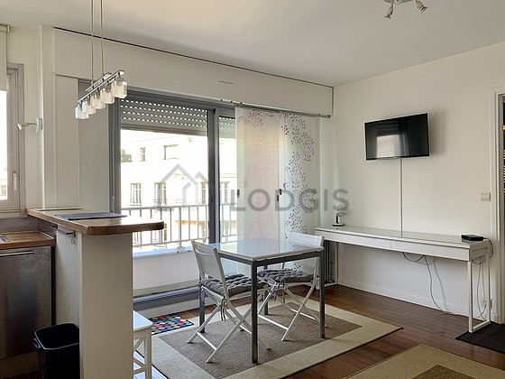 Very bright living room furnished with cupboard, 4 chair(s)