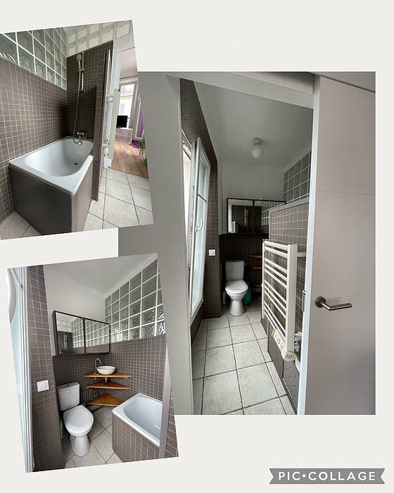 Beautiful and bright bathroom with windows and with tile floor
