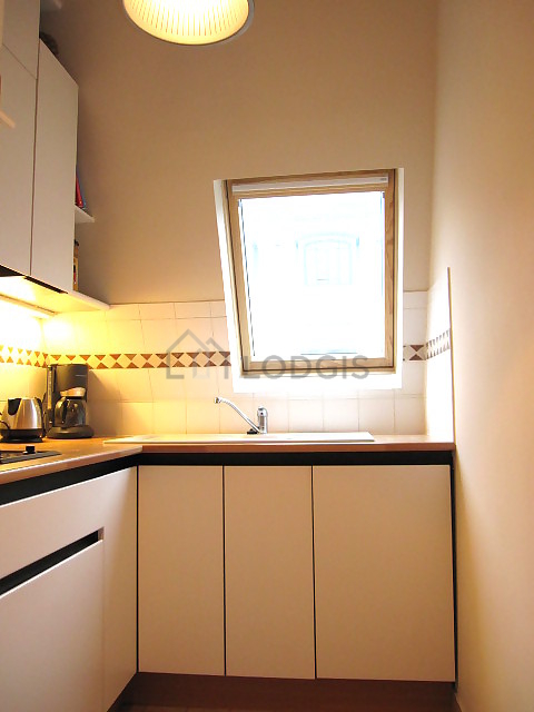Kitchen equipped with dishwasher, hob, refrigerator, freezer