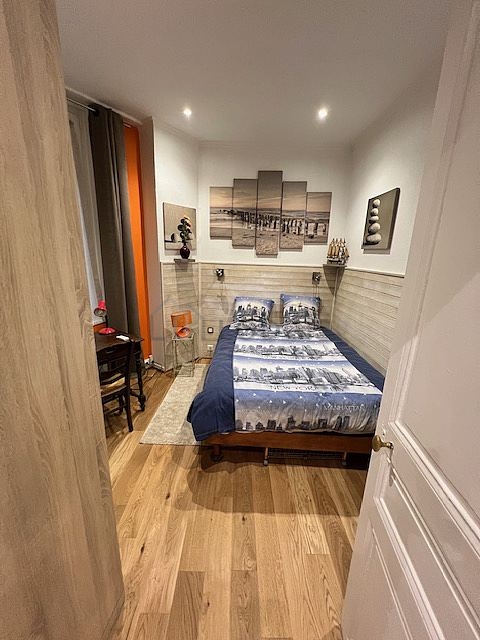 Bedroom with wooden floor