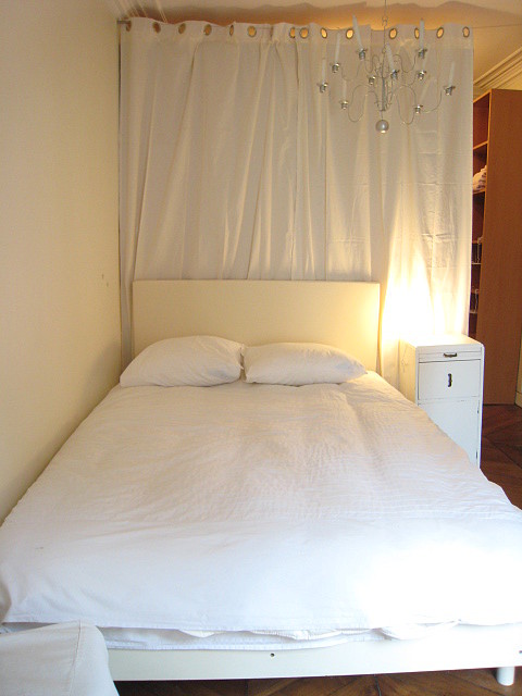 Bedroom with wooden floor