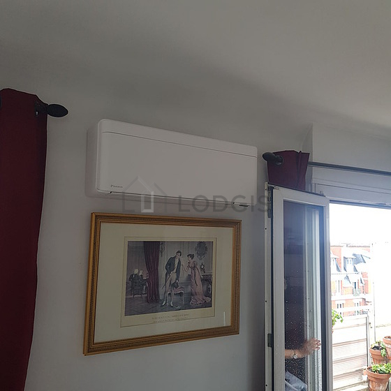 Very bright living room furnished with wardrobe, cupboard, 4 chair(s)