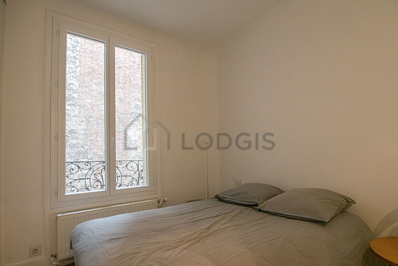 Bedroom with windows facing the courtyard