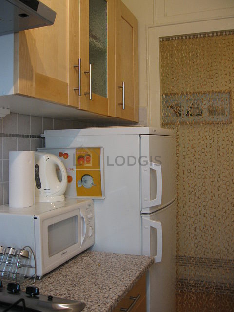 Bright kitchen with windows facing the courtyard