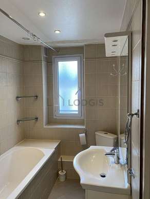 Beautiful bathroom with double-glazed windows and with tilefloor
