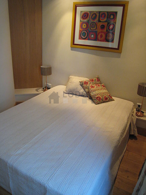 Bedroom with wooden floor
