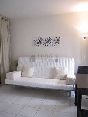 Very quiet living room furnished with 1 sofabed(s) of 140cm, tv, wardrobe, 2 chair(s)