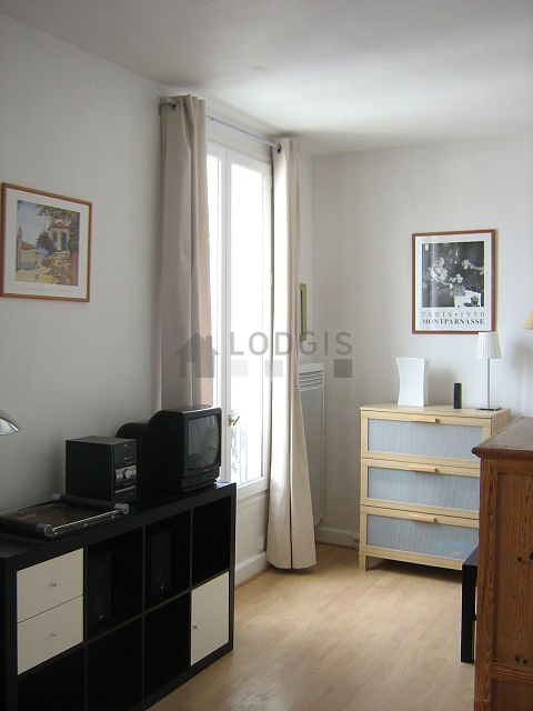 Quiet living room furnished with 1 sofabed(s) of 140cm, tv, hi-fi stereo, wardrobe