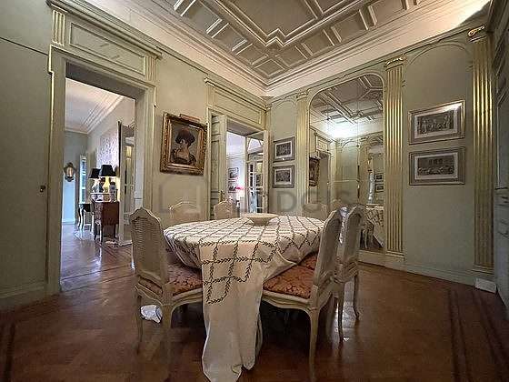 Beautiful dining room with woodenfloor for 10 person(s)